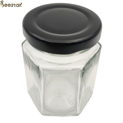 Купить шестиугольника ясности бутылки 45ml 65ml 85ml 35ml Muti опарник меда призменного стеклянный онлайн изготовление