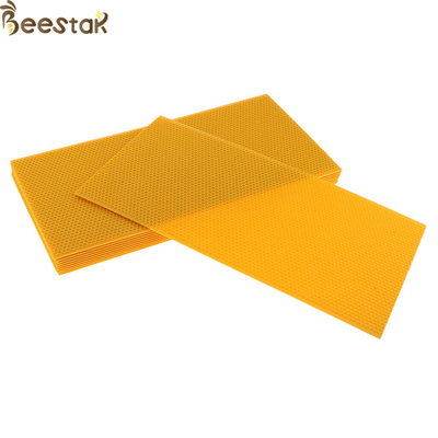 Купить Лист учреждения гребня beeswax качества еды 100% ранга инструментов пчеловодства наградной чистый желтый онлайн изготовление